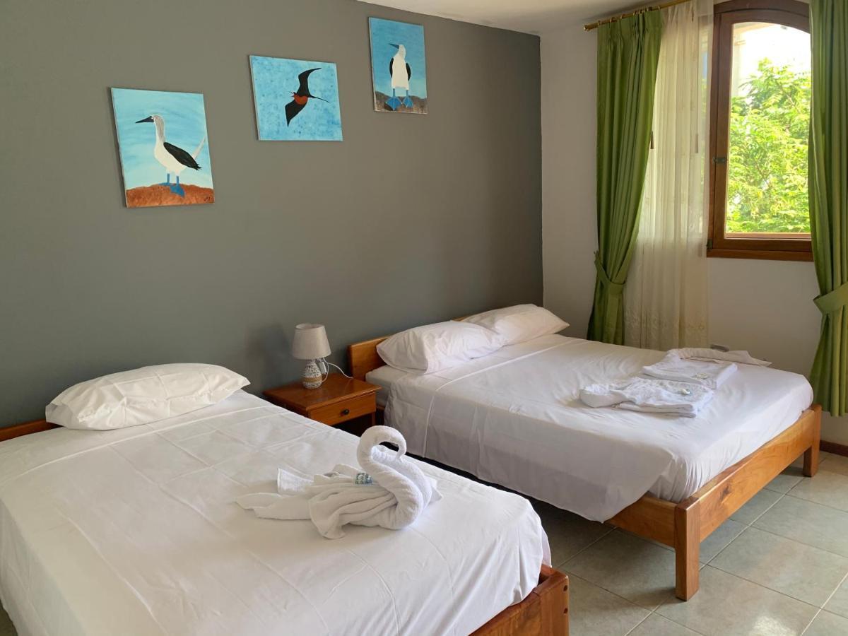Hostal White House Galapagos ปูแอร์โตอาโยรา ภายนอก รูปภาพ